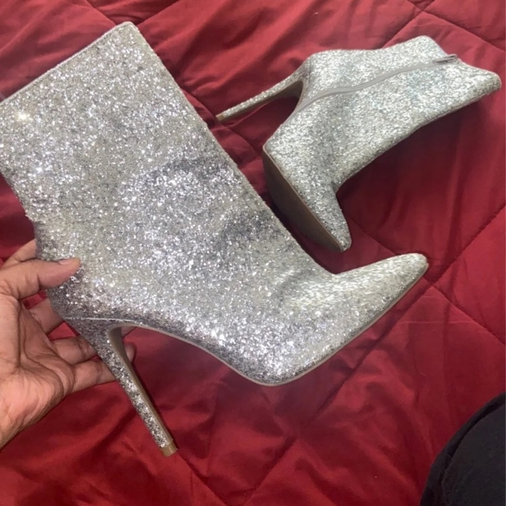 Shiny heeled boots